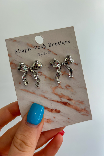 mini silver bow earrings